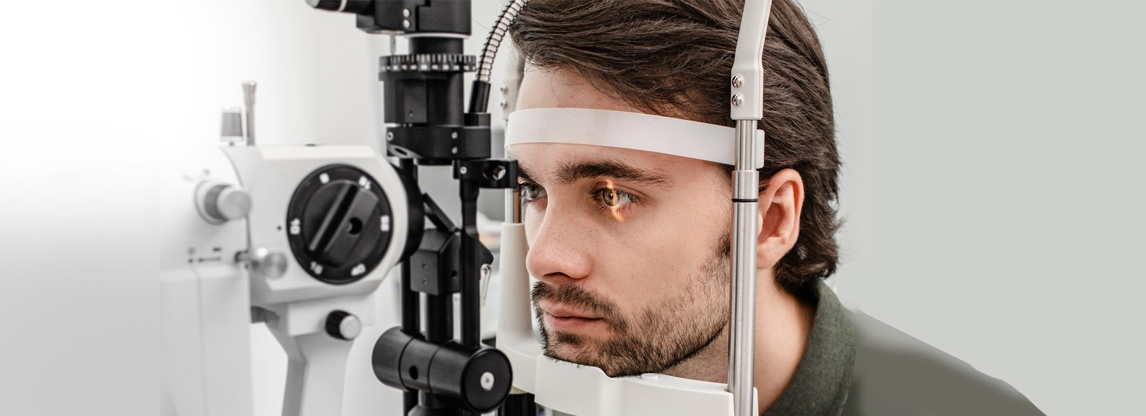 young man during eye exam in Huron